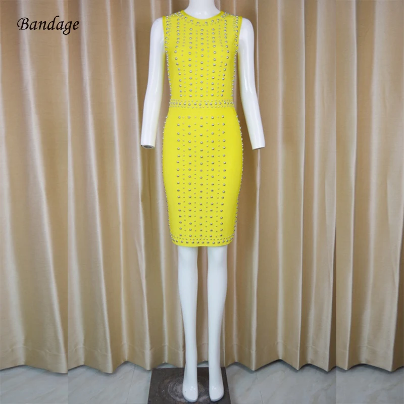 

Женское облегающее платье без рукавов, с круглым вырезом и бусинами