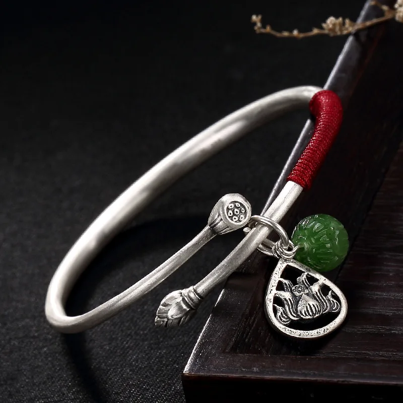 

S999 fine silver restoring ancient ways is hetian jade lotus high-grade red rope benmingnian bangle bracelets wholesale