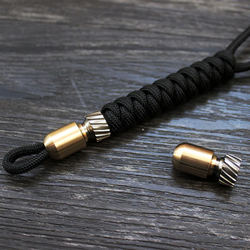 Koop 1PC Hand Geweven Paraplu Touw Weven Paracord Survival Armband Met Messing Torpedo Vorm Kraal Titanium Legering Opknoping Gesp