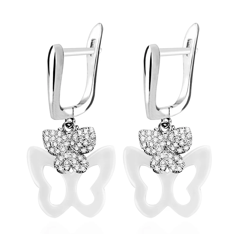 Комплект сережек бабочек с кристаллами черно белые керамические модные