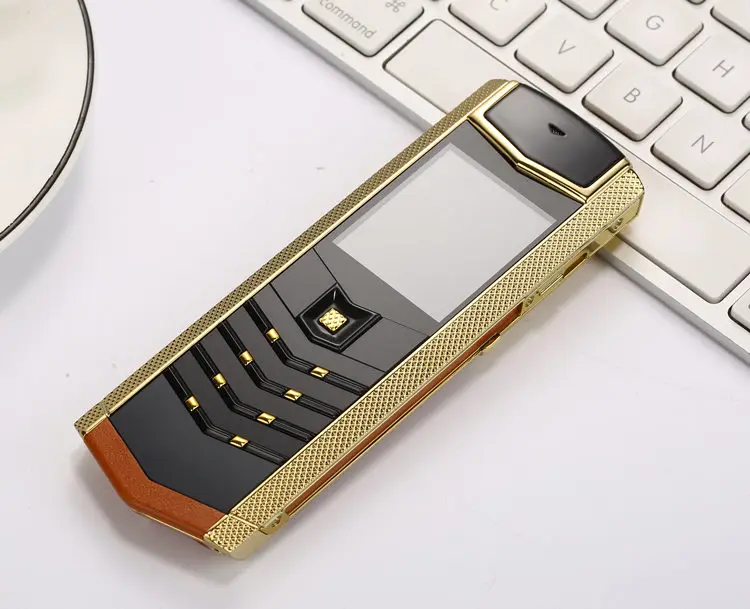 Роскошный Металлический+ кожаный корпус Gsm Dual Sim Сотовые телефоны Bluetooth мобильный телефон V1 Поддержка Русская клавиатура