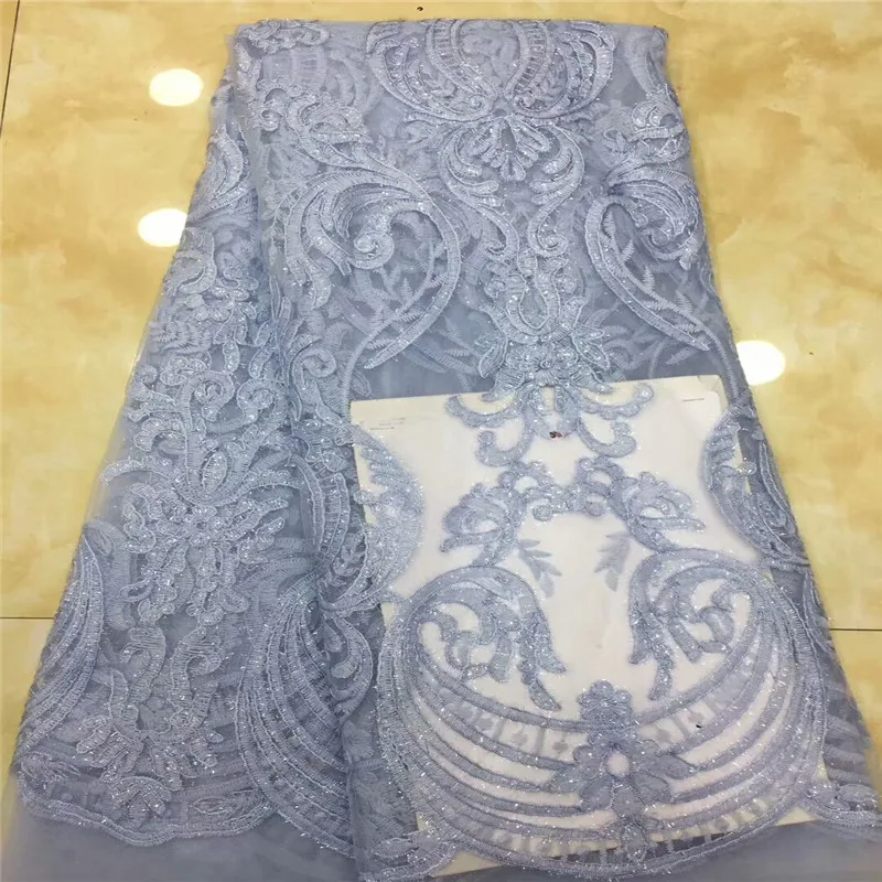 

2019 Popular African lace fabrics for wedding white French African lace fabric with sequins latest tulle lace fabric dp65-1550