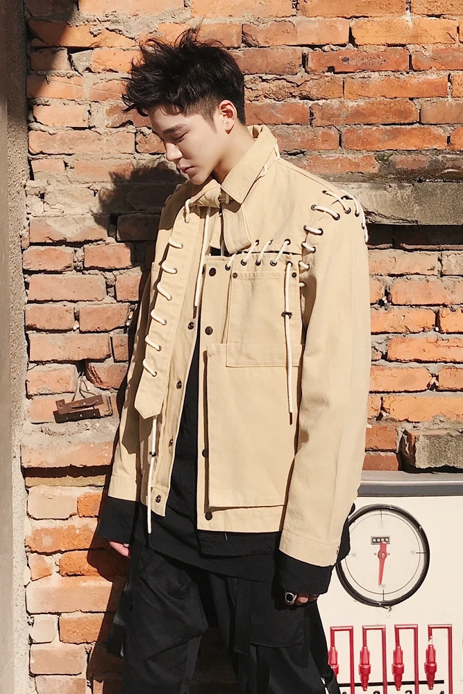 

Spring and autumn show the new three-dimensional pasted bag wear rope tie belt decoration asymmetric design loose jack. M-2XL