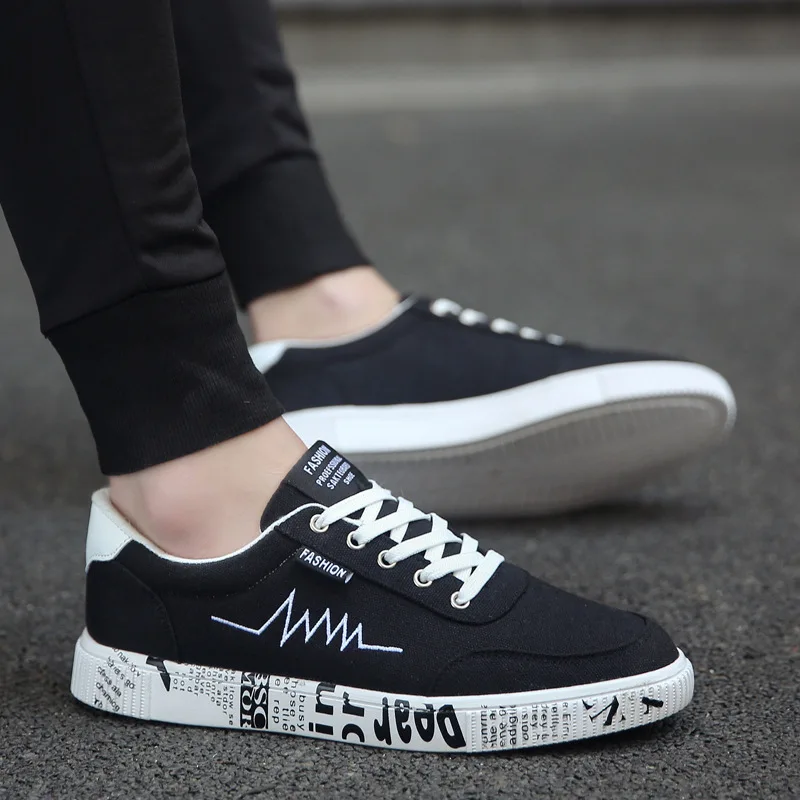 

2022 New Fashion Men Vulcanized Shoes Sneakers Ladies Lace-up Casual Shoes Breathable Walking Canvas Shoes Graffiti Flat