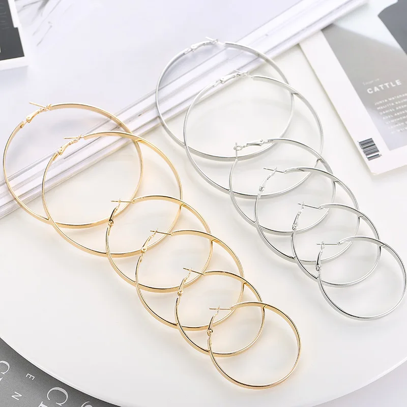 Простые металлические глянцевые геометрические большие круглые серьги