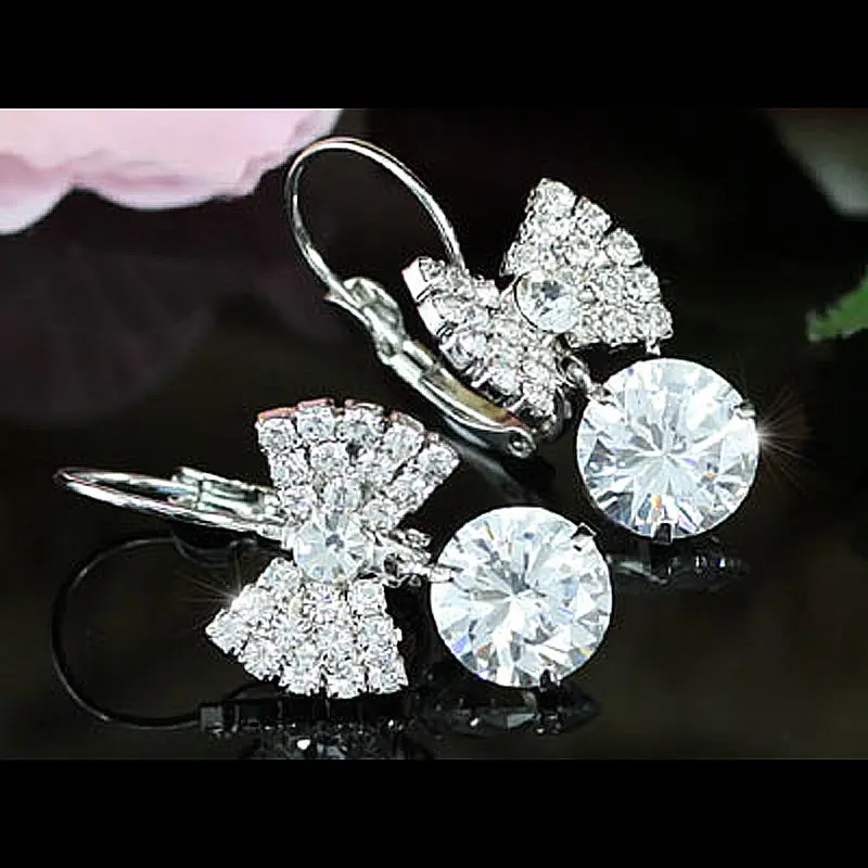 Белые серьги с павлиньими звездами луком и австрийским кристаллом CSE118|earrings austrian