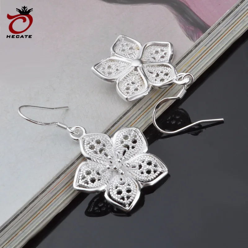 Европейские и Американские модели моды взрыва hollow Роуз серьги изящных ювелирных