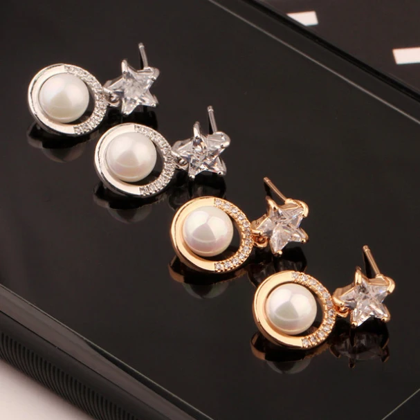 

Серьги в виде пяти звезд с инкрустацией