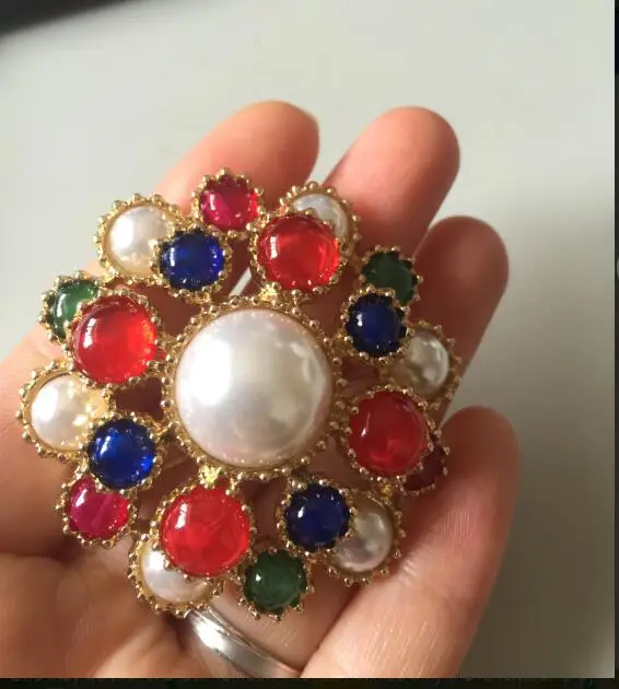 

Brooch emerald colored gemstone brooch brooch pin Baroque luxury