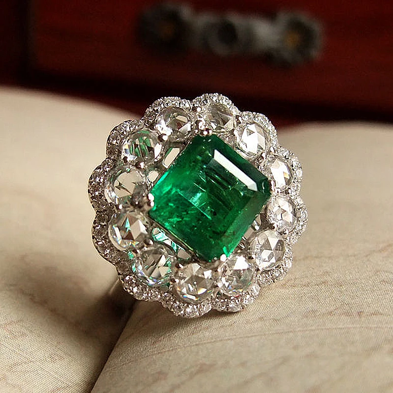 

Женское кольцо для помолвки, 18 K, белое золото 1.2ctw, Moissanite, зеленый изумруд