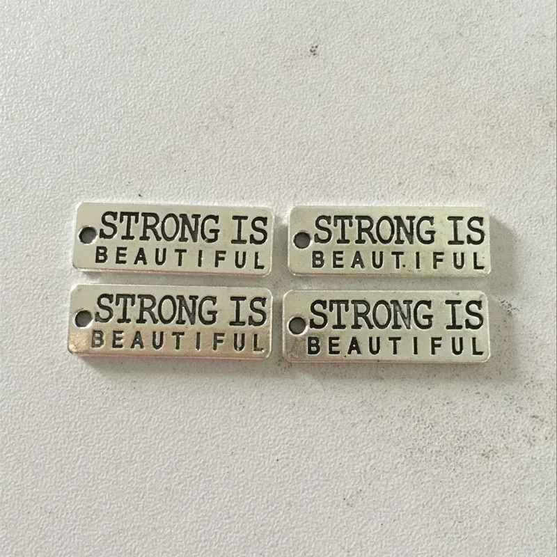 

8pcs Silver Plated STRONG IS Charm Pendant Jewelry Accessories