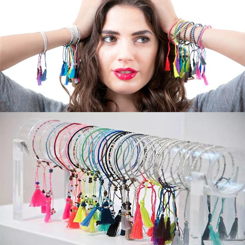 Женский пляжный браслет с кисточками разноцветный ручной работы бусинами