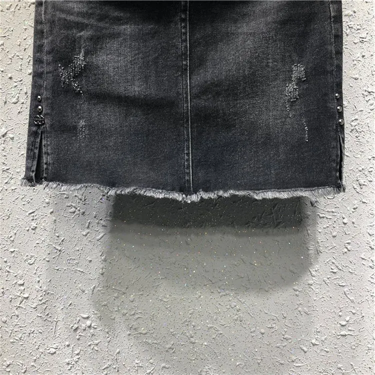 Женская Повседневная джинсовая юбка черная рваная с бахромой и заклепками
