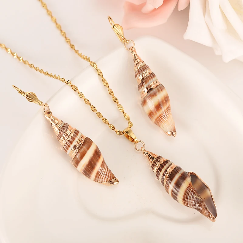 Комплект ювелирных изделий в африканском стиле с подвеской виде золотого