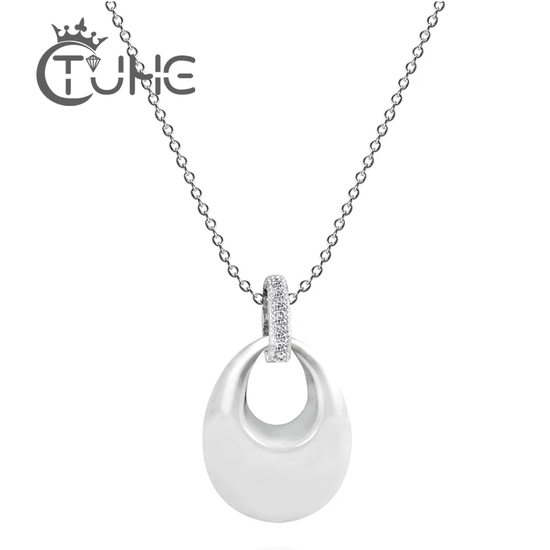 Женская цепочка с керамическим кулоном серебристая кристаллами и стразами 2