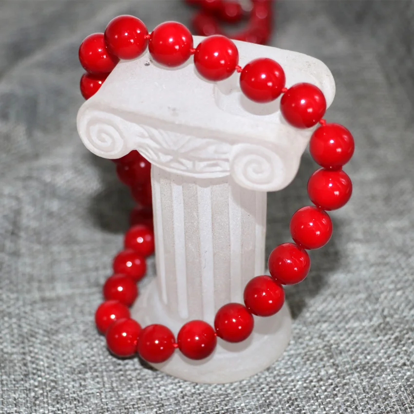 Цепочка с красными искусственными коралловыми бусинами 12 мм | Украшения и