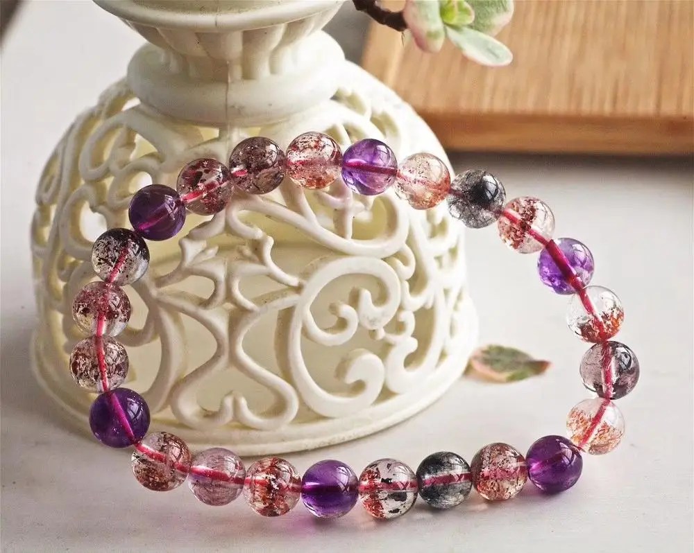 

7.8mm Natural Super Seven 7 Crystal Rutilated Melody Stone Hair Beads Bracelet