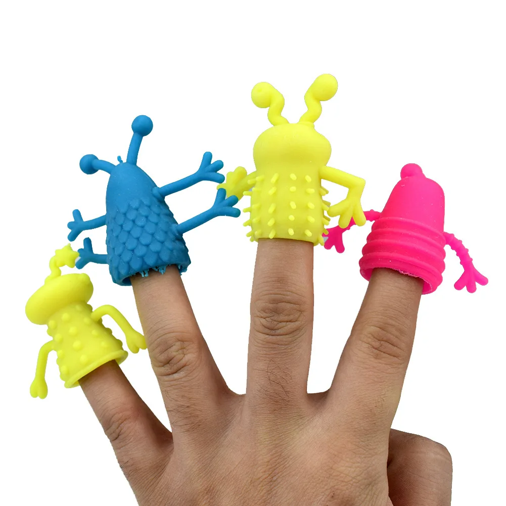 4pcs/lot Novel TPR plastic cute expression doll fingers finger set pen cover toys storytelling props Robot monster toy for kids | Игрушки и