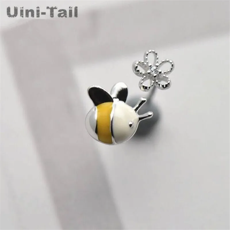 

Uini-Tail hot new 925 sterling silver asymmetric temperament sweet hollow flowers little bee earrings girls cute fashion trend