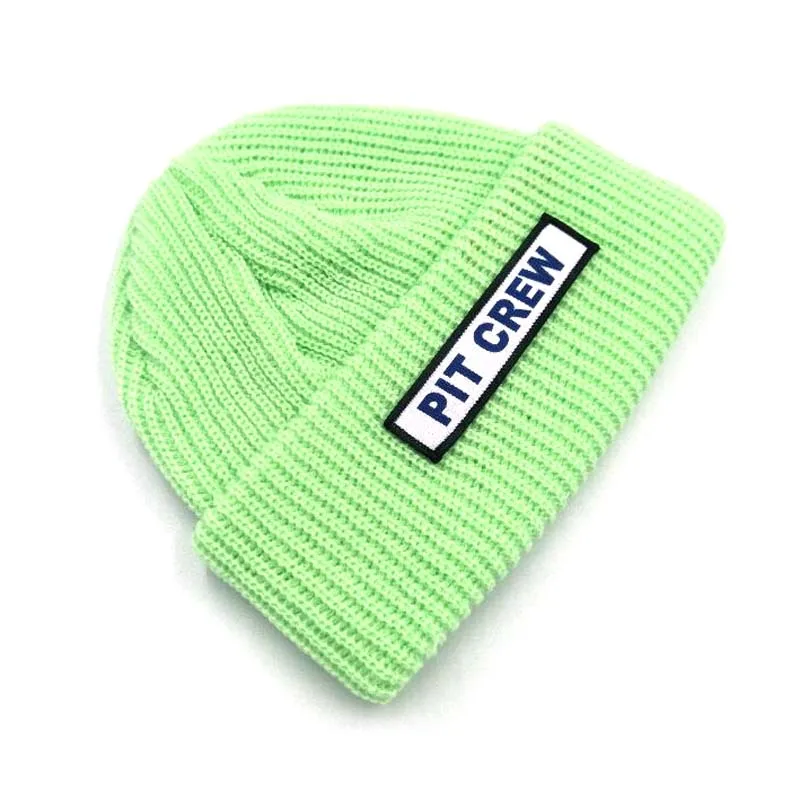 Mint green Очаровательный карамельный цвет с нашивками в виде букв детские вязаные шапки осень-зима бренд отбортовки головные уборы Skullies женские шапочки с помпоном шерстяная шапка для мальчиков и девочек - Цвет: Mint green