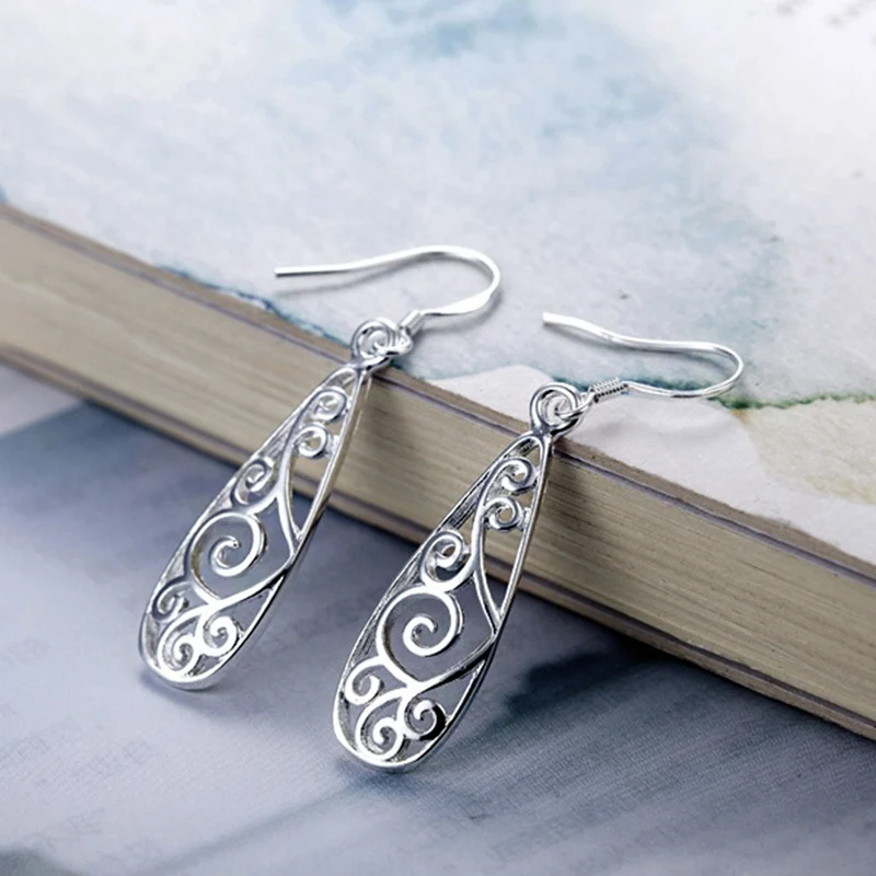 Оформление c резными выемками снаружи очарование серьги для женщин Этнический