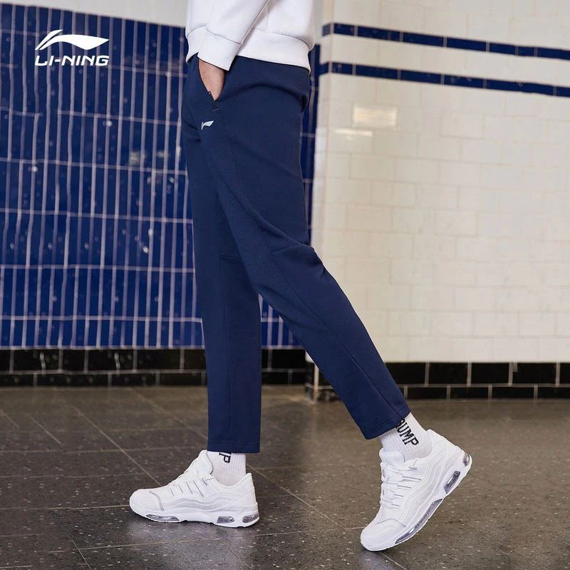 Мужские тренировочные штаны Li-Ning спортивные из 63% полиэстера с подкладкой хлопка