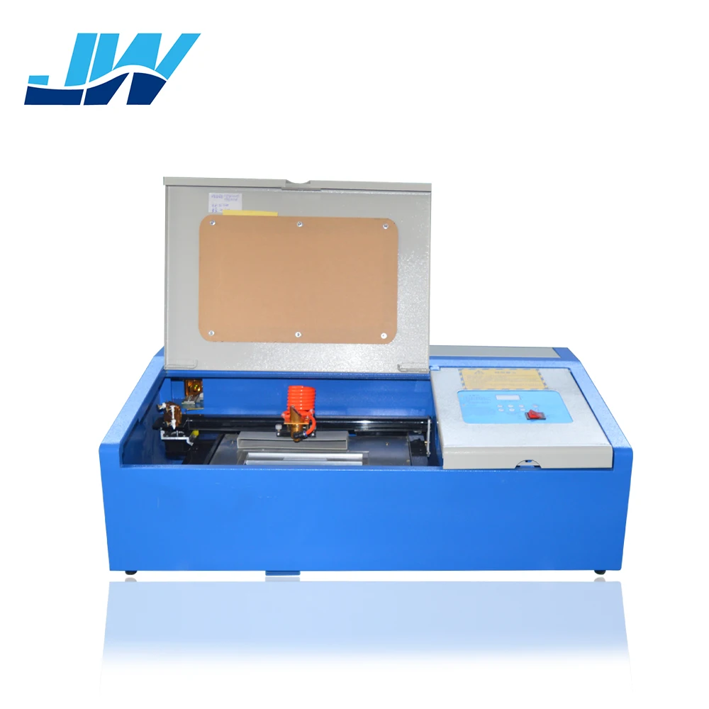 Цена по прейскуранту завода 50W CNC CO2 резиновый лазерный гравировальный станок |