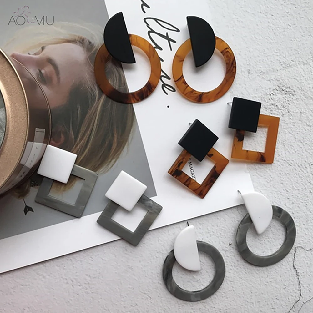 Геометрические акриловые сережки серьги с закрученными круглыми и полукруглыми