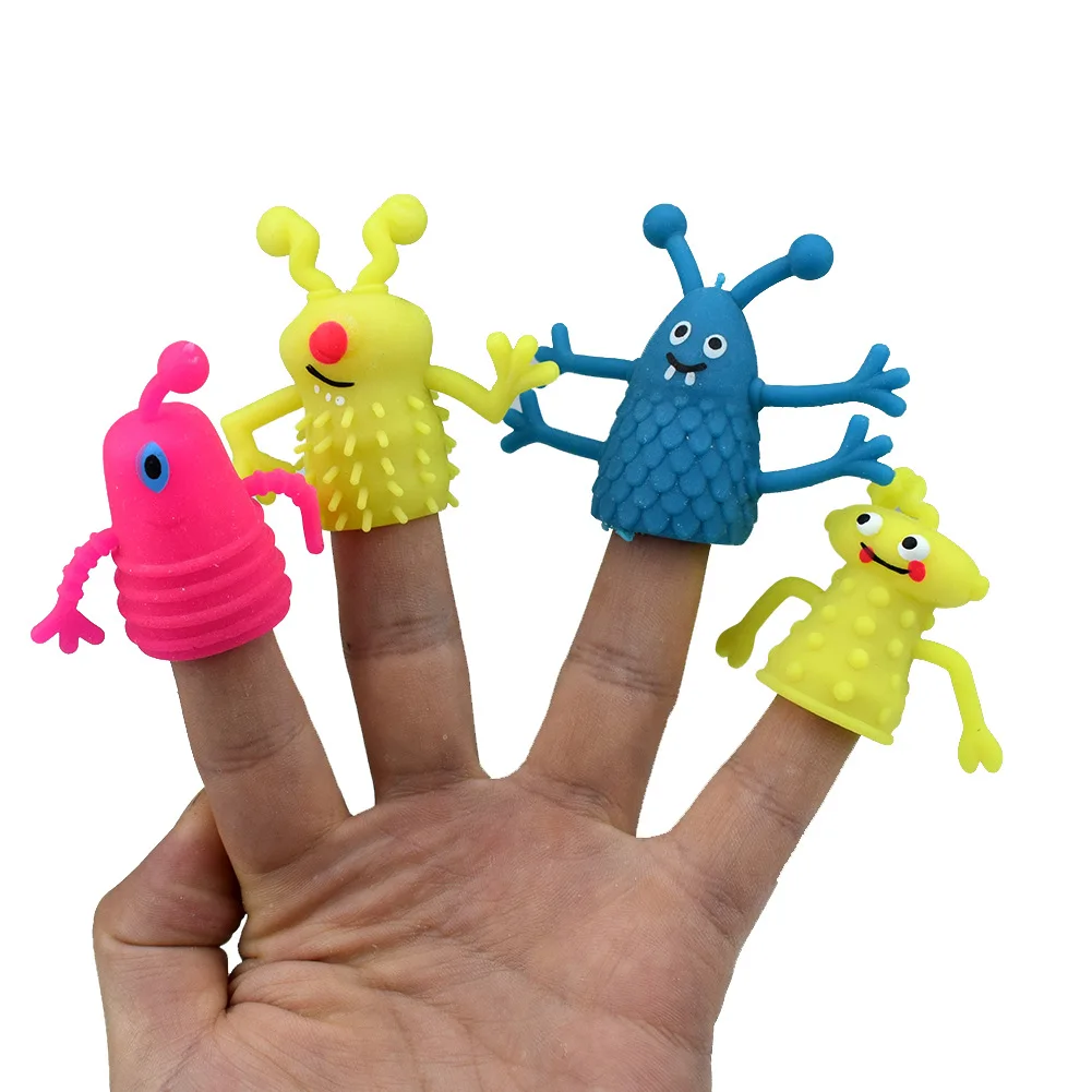 4pcs/lot Novel TPR plastic cute expression doll fingers finger set pen cover toys storytelling props Robot monster toy for kids | Игрушки и
