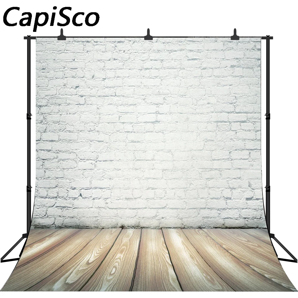 Capisco черно белая кирпичная стена с дощатым полом и драпировкой фото фон для