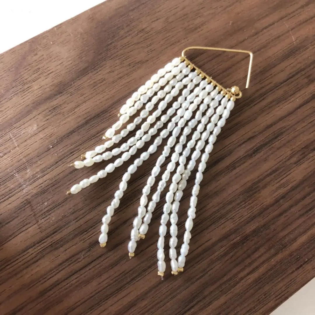 

New simple European and American fashion temperament brass woven natural Pearl Tassel earrings women