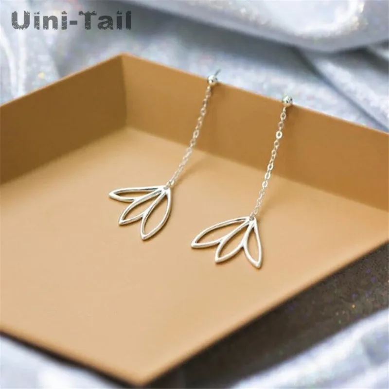 Серьги Uini-Tail гипоаллергенные из серебра 925 пробы с полыми тремя листьями |