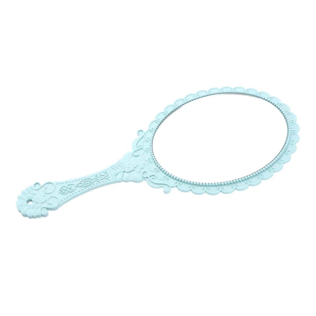 Старинное винтажное пластиковое овальное портативное зеркало с ручкой