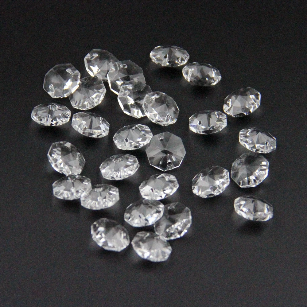 

Hot sale!!! with 10000pcs/lot 14mm crystal octagon beads with 2 holes , transparent color