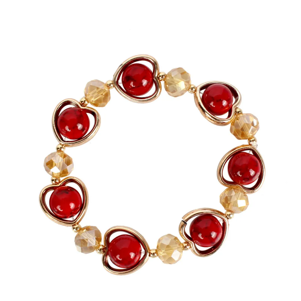 Женский браслет с подвесками украшенный кристаллами и бусинами подарочные