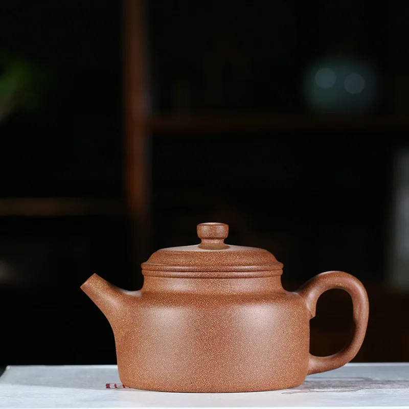 

Yixing purple clay pot genuine hand-made high-quality peach blossom mud Dezhong pot Kungfu teapot teapot Gift Set