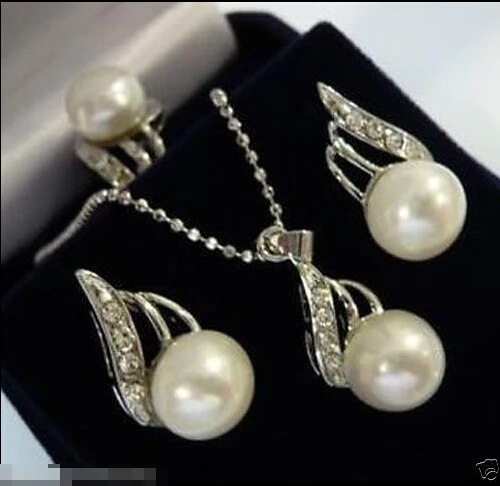 

Charming white pearl pendant necklace earring ring set