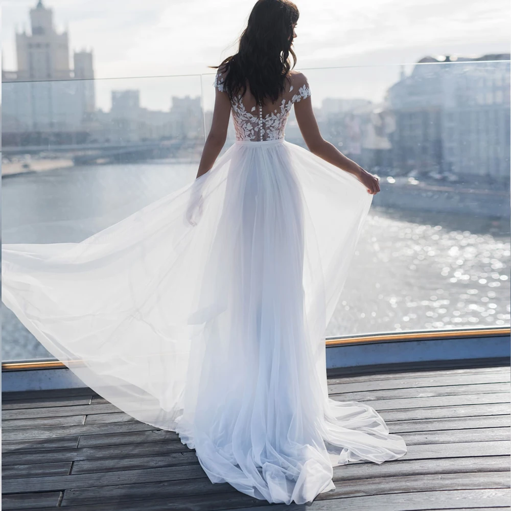 Модное богемное свадебное платье с глубоким вырезом и рукавами крылышками