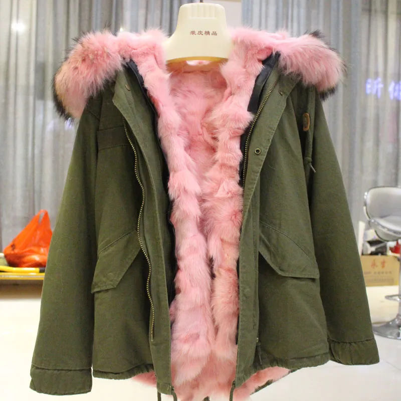 Женская куртка с мехом енота толстая теплая парка цвета хаки подкладкой из