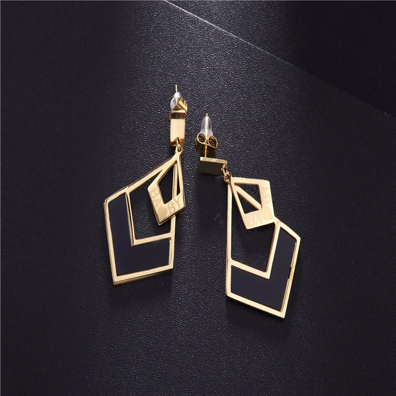 Earrings. Women's jewelry. Geometric type titanium earrings. Triangle Earrings accessories | Stud