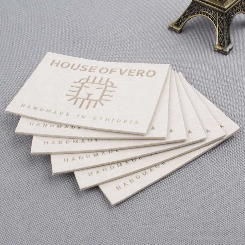 Пользовательские тисненые этикетки из ПУ в основном для джинсов или сумок