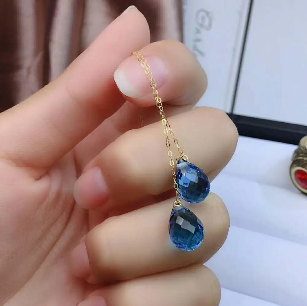 Классические серьги подвески с темно синим топазом из 18 каратного желтого золота