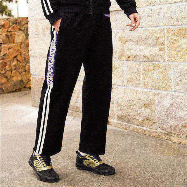 Mark Fairwhale 2019 new arrival men straight pants mid waist drawstring loose side stripe printed knitted trousers 718123011008 |