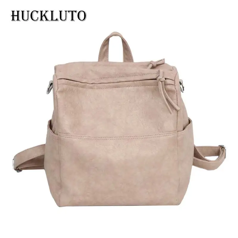 Женский кожаный рюкзак HuckLuto черный и белый со складками на молнии скидкой по