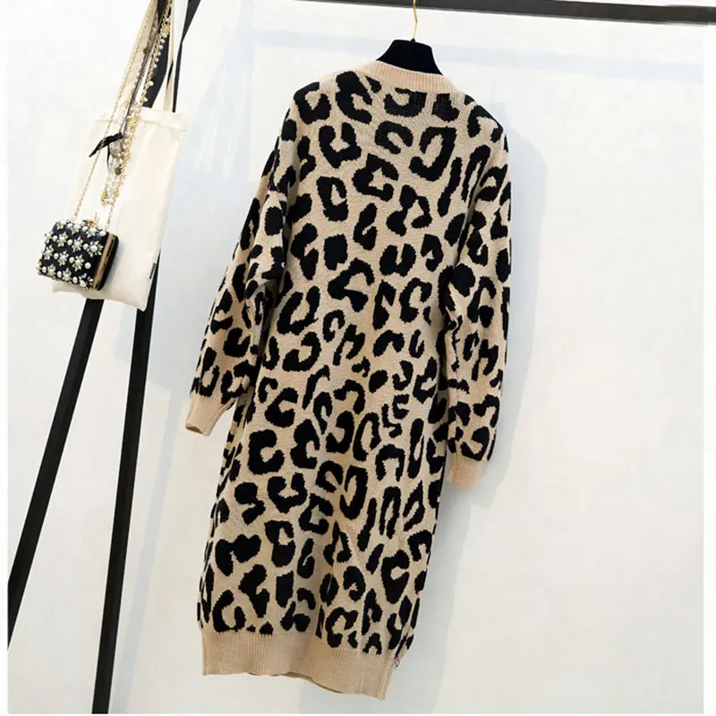 

Autumn and winter long knit women's bat sleeves loose large size bottoming leopard sexy V-neck knit pullover dress AL403