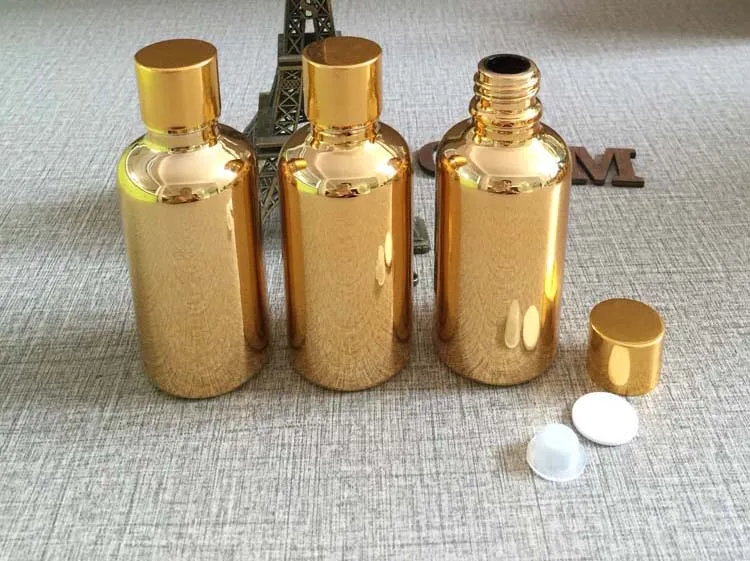 

high-grade 50ml golden essential oils in glass bottles for sale , wholesale round empty golden 50 ml glass dropper bottle bulk