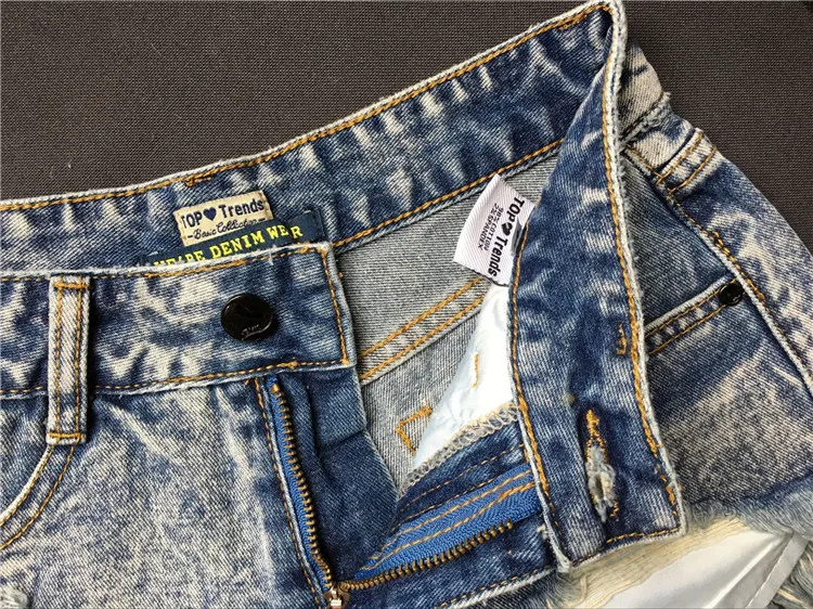 Women's Jeans New Fashion Slim High Waist Grinds Irregular Leaks Pockets Tassel Snowflakes Retro Denim Shorts