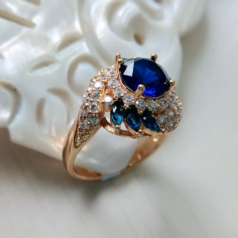 

Yunkingdom Unique Style Blue Gems Zirconia CrystalGold Color Rings for Women Wedding BrideRing Dropshipping