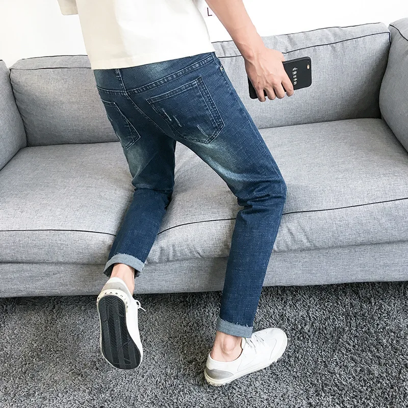 Рваные летние мужские джинсы брендовые черные зауженные рваные брюки до