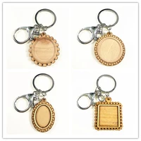 24pcs wood cabochon settings 25mm 1825mm inner size blank cameo pandent base trays with metal buckle for keychain making